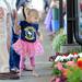 Bre Bottom, 2, of Ann Arbor, checks out some colorful flowers as she visits the Ann Arbor Farmers Market with family on the first Wednesday morning market of the season.  Melanie Maxwell I AnnArbor.com